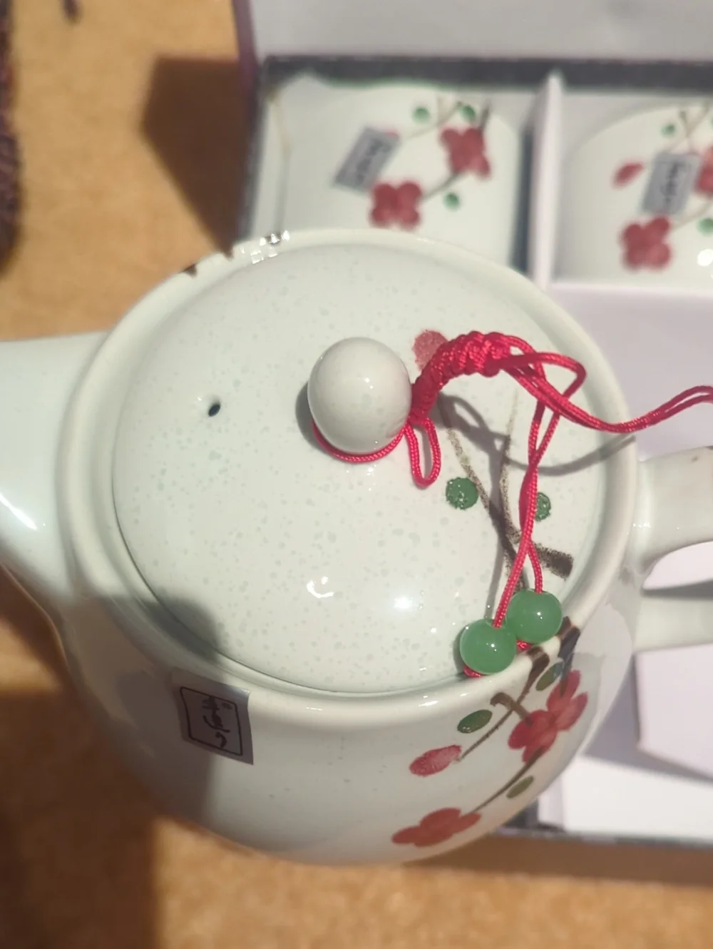 Ceramic White Teapot and Cup Set with Red Floral Accents